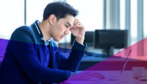 an unproductive worker at his desk