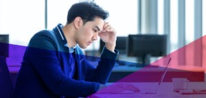 an unproductive worker at his desk