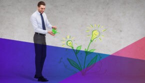 Man watering a plant of light bulbs