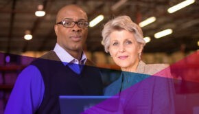 Industrial Management personnel standing in a warehouse