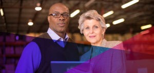 Industrial Management personnel standing in a warehouse