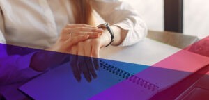 woman looking at her watch in a job interview