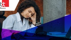 A stressed woman at her desk