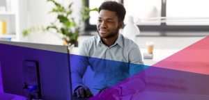 a data entry specialist on his computer