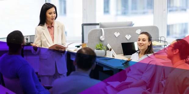 a businesswoman holding a notebook leading a team meeting