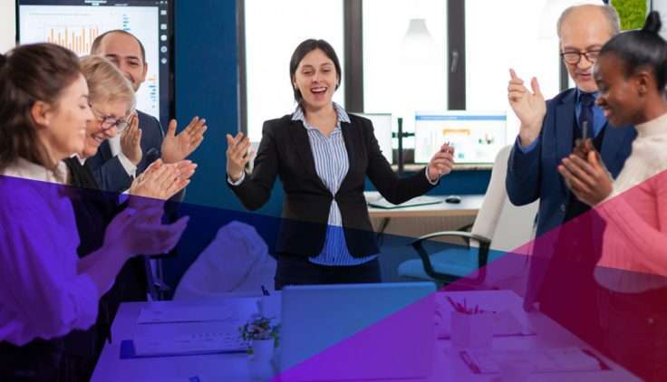 A businesswoman happily leading a business meeting